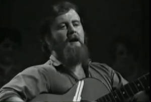 christy moore plays guitar